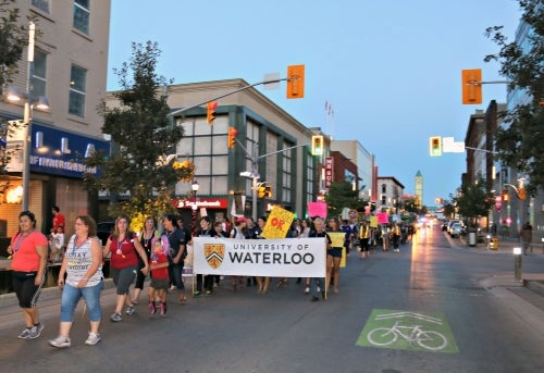 The University of Waterloo Take Back The Night participants marching.