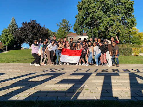 Indonesian students on an exchange pose on the University campus.