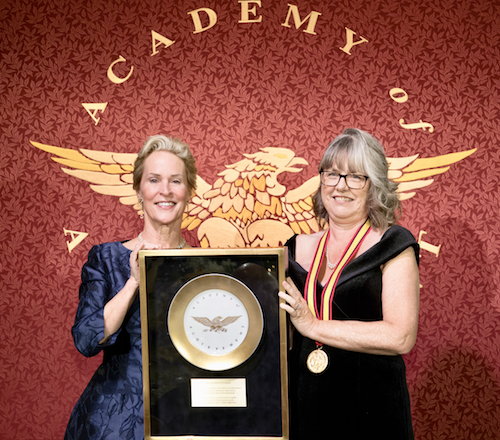 Frances Arnold, Caltech professor and Nobel laureate in Chemistry, and Donna Strickland, Nobel Laureate in Physics, with the golden plate.