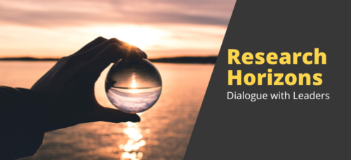 Research Horizons graphic showing a person holding a glass sphere up to a lake.