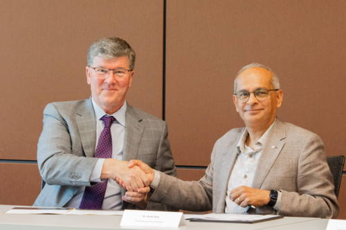 Dr. Keith Stewart, vice-president of Cancer and director of the Princess Margaret Cancer Program, and Dr. Vivek Goel, president and vice-chancellor of Waterloo, at the Memorandum of Understanding (MOU) signing ceremony with Princess Margaret Cancer Centre (PM)