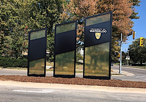 The new three-piece campus gateway sign at University Avenue.