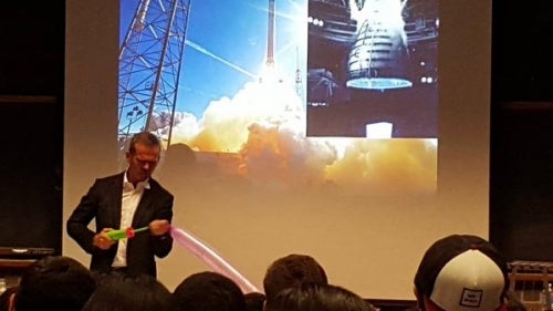 Chris Hadfield delivers a lecture with props.