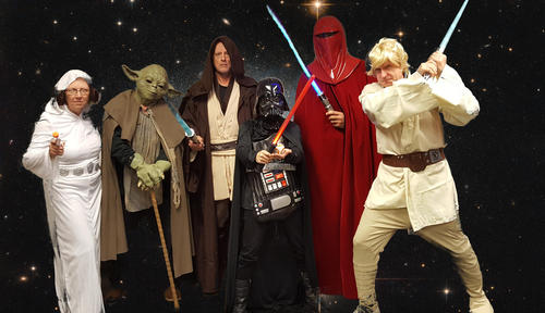 The University's six Dean as Star Wars characters posing against a galactic backdrop.