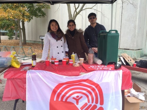 University Relations volunteers operate the Hot Chocolate booth.
