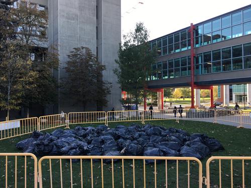 A pile of trash bags outside the Davis Centre, part of Zero Waste Week.