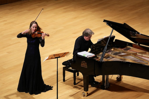 Nancy Dahn plays the violin and Timothy Steeves plays the piano.