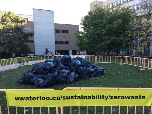 A growing pile of trash bags outside the Davis Centre. 