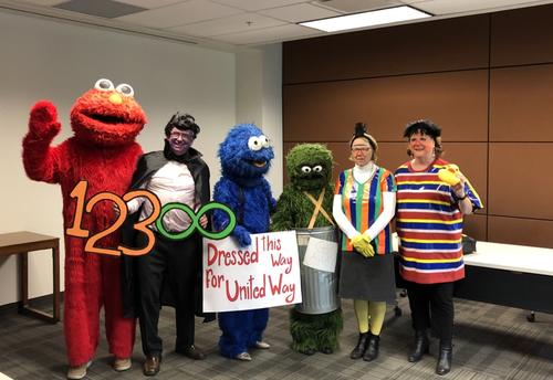 The University's deans dressed as Sesame Street characters.