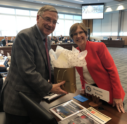 Board Chair Cindy Forbes presents Ken Seiling with a gift at the October 2018 meeting of the Board of Governors.