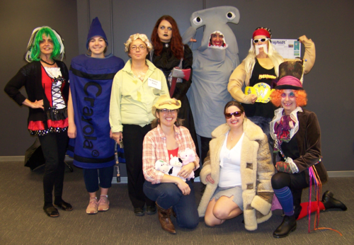 Members of Plant Operations pose in their costumes.