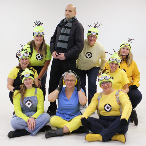 Employees dressed as Minions and Gru from Despicable Me.