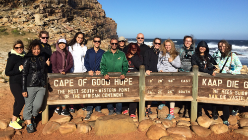 Waterloo students and professors stand at the Cape of Good Hope.