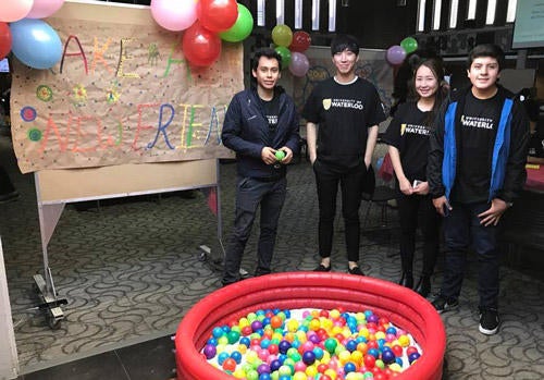 BASE volunteers with a ball pit in the Student Life Centre.