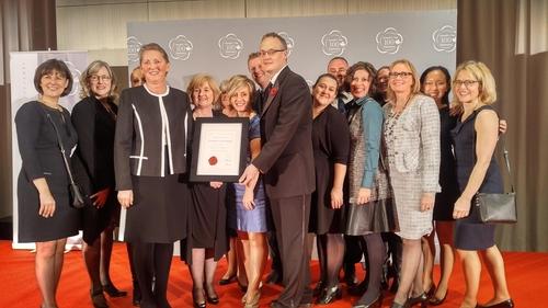 University of Waterloo representatives pose with the 2018 Canada's Top 100 Employers certificate.