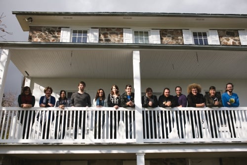 Mennonite History students pose on the balcony of the Brubacher House.