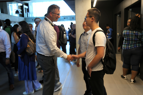 Chris Read, Associate Provost, Students, talks with students during International Orientation 2019.