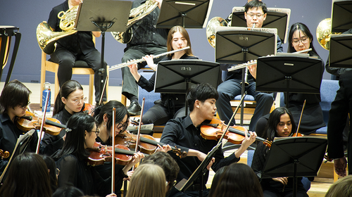 The members of Orchestra@Uwaterloo performing.