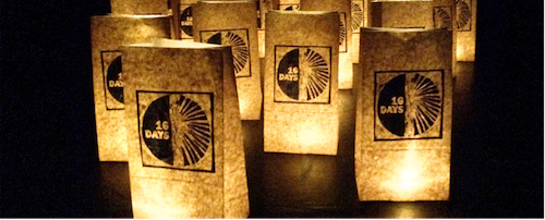 Paper lanterns lit from within with the &quot;16 Days&quot; logo printed on them.
