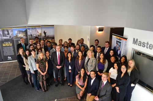 Master of Public Services students pose for a photo with Steve Orsini.