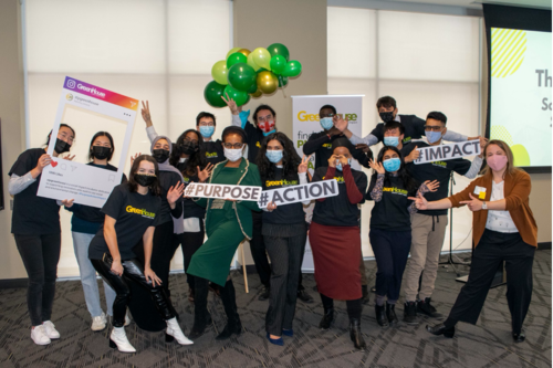 Winners of the Social Impact Fund pose in a group photo. Don't worry, they're wearing masks.