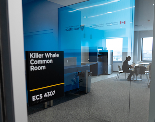 A sign indicating the &quot;Killer Whale Common Room&quot; in the collaboration hub.