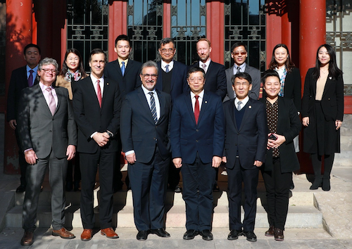 Members of the University of Waterloo delegation with representatives from Tsinghua University outside the President's office.