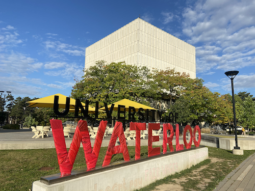 The University of Waterloo sign wrapped in red.