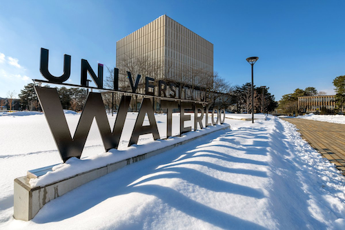 The University of Waterloo sign in a winter environment.