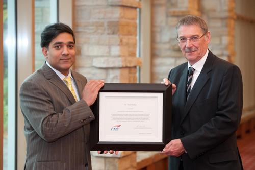 Dr. Neil Sarkar winning the Douglas R. Colton Medal for Research Excellence in 2014. 