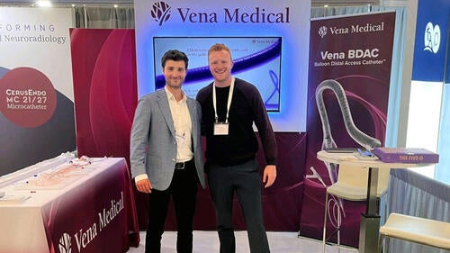 Michael Phillips (R) and Phil Cooper (L) standing in front of a Vena Medical sign.
