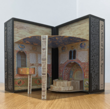 A paper model of the synagogue.