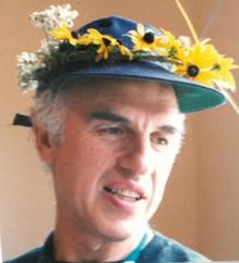 A picture of Saul with flowers on his hat