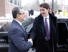 Feridun Hamdullahpur greets Justin Trudeau in January 2016.