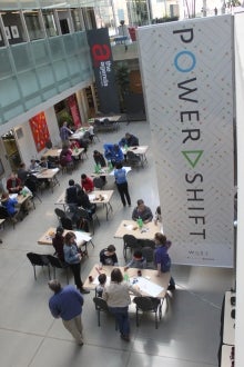 An overhead image of PowerShift discussions taking place.