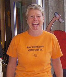 Jennifer Ferguson in an orange t-shirt.