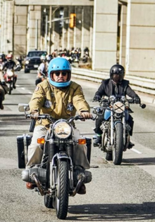 Carlos Radic on a vintage motorcycle wearing a vintage Crash helmet.