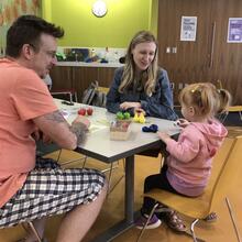 Siobhan Sutherland, PhD candidate in clinical psychology, with her partner and child at KPL in 2019.
