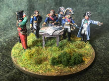 A group of 28-millimetre scale miniature military officers.
