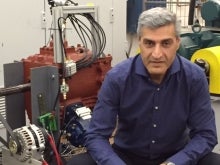 Amir Khajepour with the battery system.