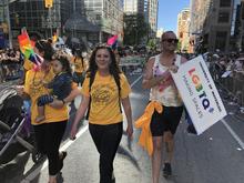 Professors Lisbeth Berbary, Diana Parry, and Corey Johson march in the Toronto Pride Parade, promoting the LGBTQ+ Making Spaces initiative.