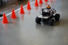 a robot racecar in motion.