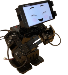 An anthromorphic robot with a tablet-screen 'head' featuring a smiley face.