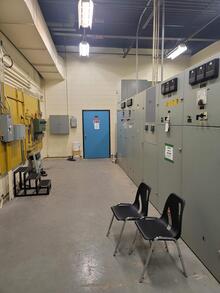 A room full of electrical generating equipment.