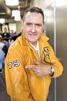 Alumnus Eric Celentano points to the &quot;79&quot; emblazoned on the shoulder of his University of Waterloo leather jacket.