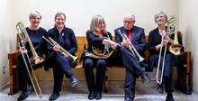 The members of the Full House Brass and their instruments.