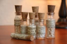 Antique bottles of homeopathic treatments.