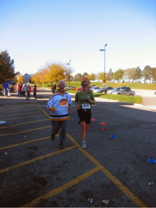 Kinesiology grad, Jody Berringer (BSc ’03) runs with Governor General David Johnston at the 2005 Fun Run.