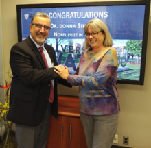 Feridun Hamdullahpur congratulates Professor Donna Strickland.