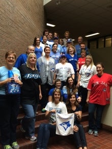 Staff from the Registrar's Office in Blue Jays colours.